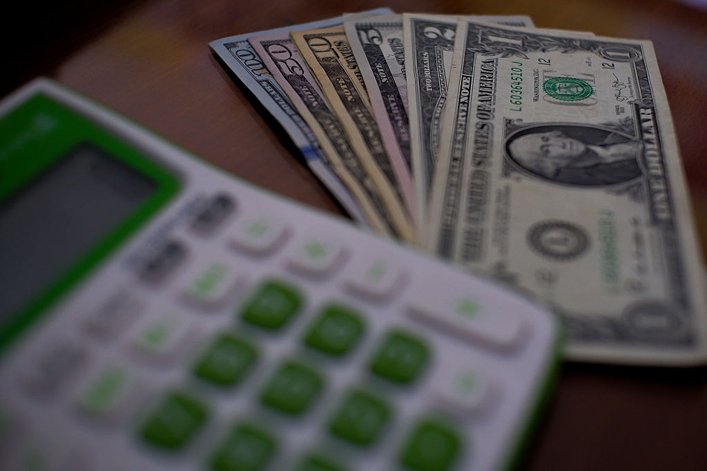 A calculator and US dollars cannabis studies pay to try pot