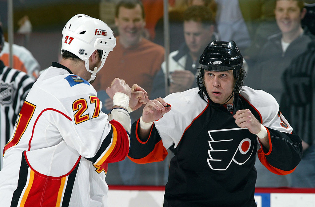 hockey players prepare to flight - peace of mind film shows some of their journeys