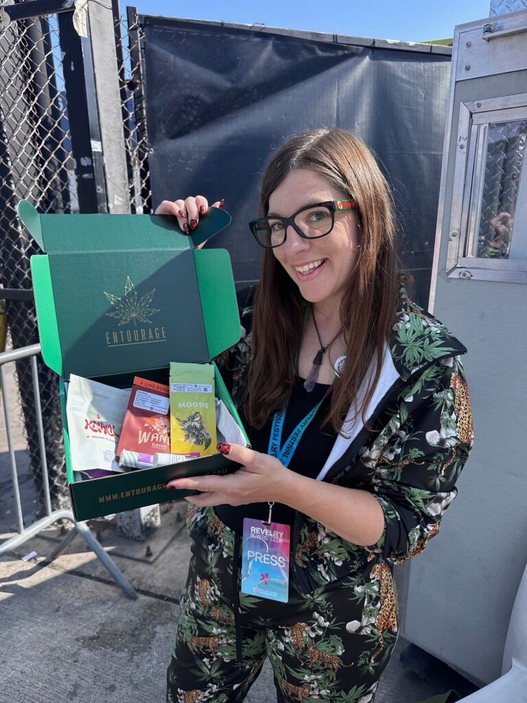 rachelle gordon holds a box of Entourage products
