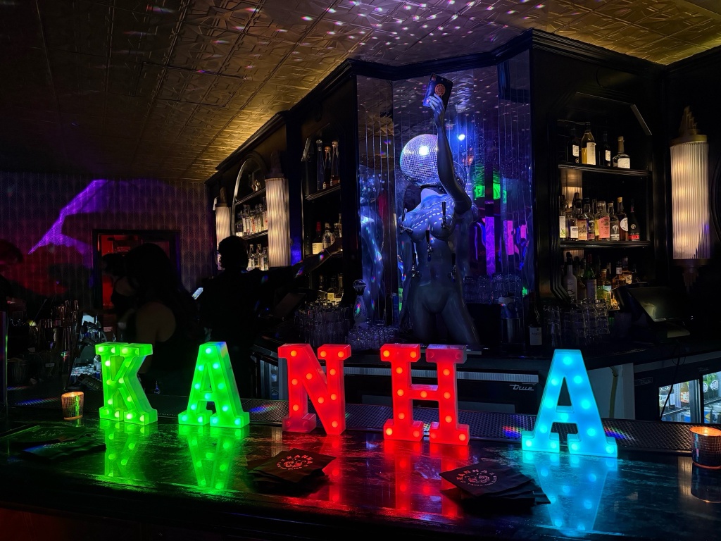 kanha edibles sign on bar