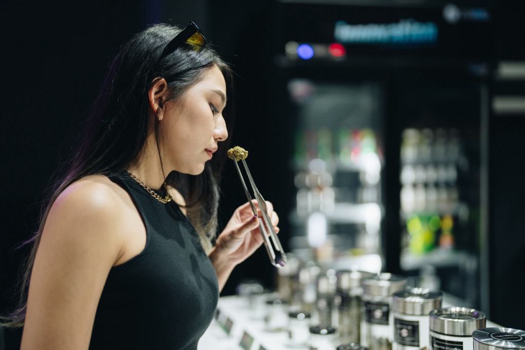 woman smells cannabis terpenes scent memory