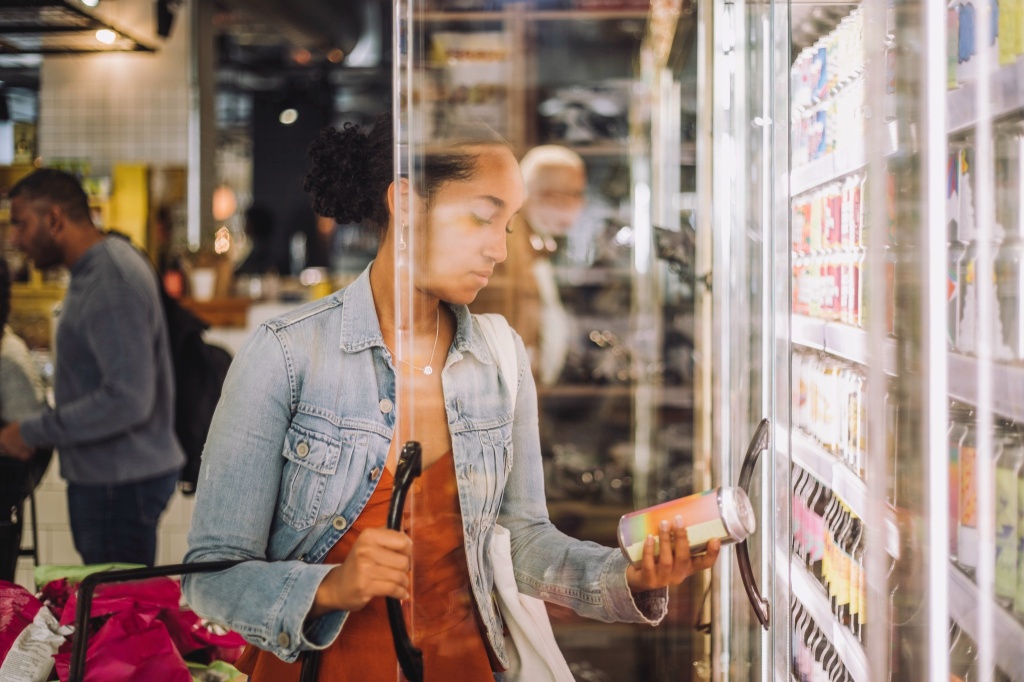 woman looks at thc drinks Circle K will start selling