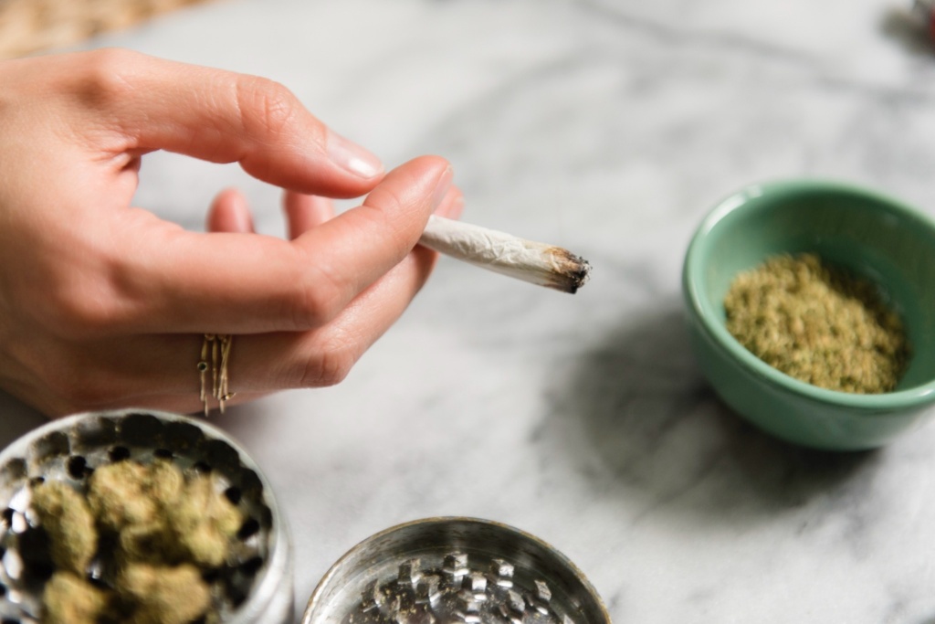 how long does a weed high last - person holding joint