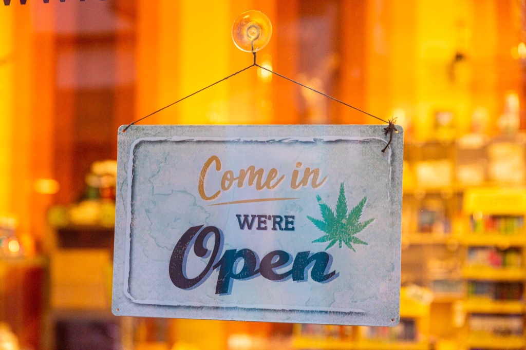 cannabis store sign green wednesday 2025