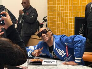snoop dogg smiles at treats to eat book launch