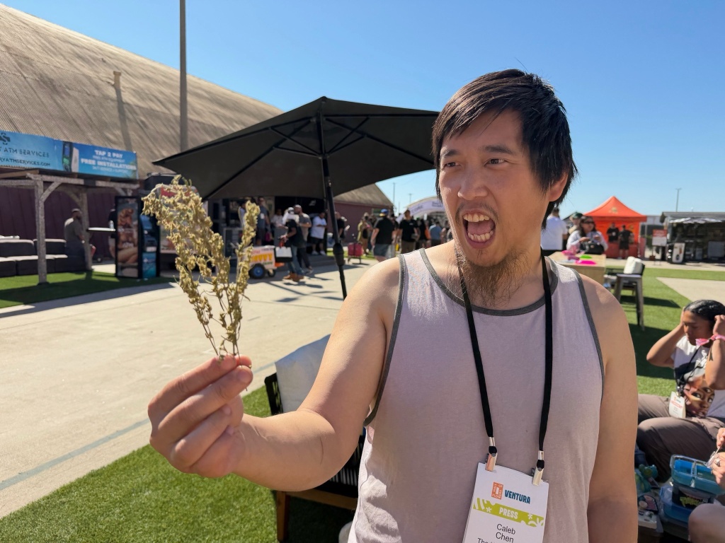 caleb chen holds cannabis at hall of flowers ventura 2026