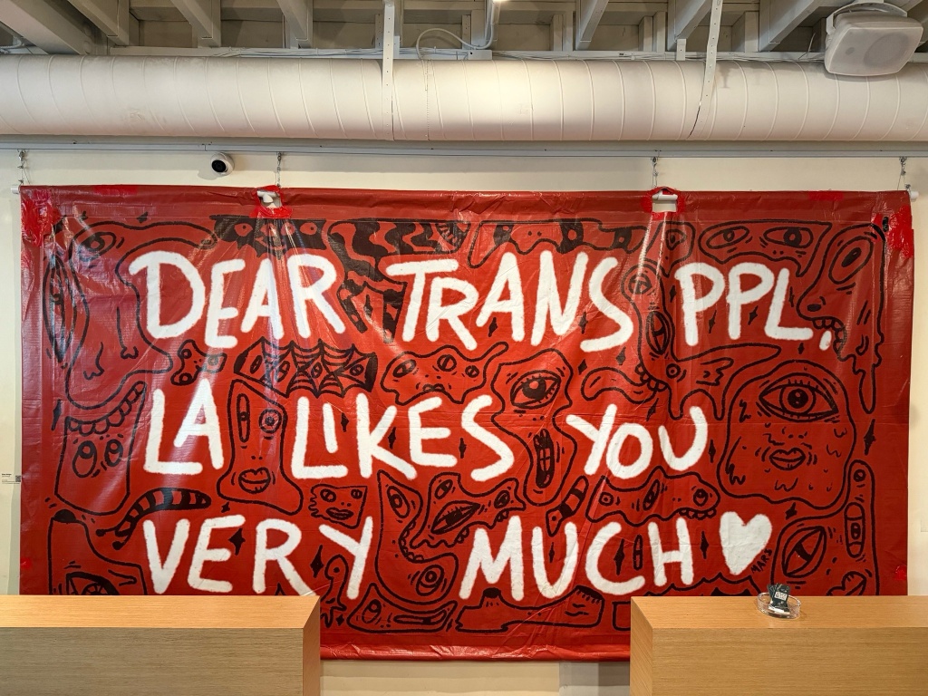 trans rights banner at the artist tree pride event