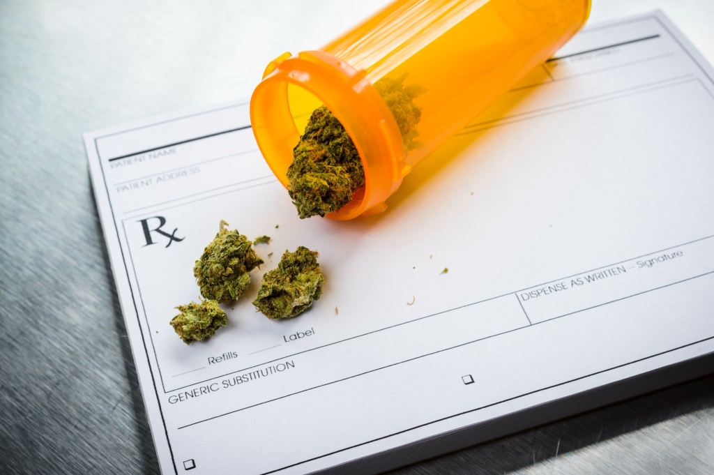 bottle of cannabis flower on prescription pad FDA THC drug