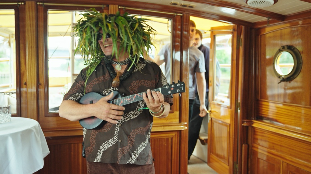 Ua Aloha Maji plays ukulele during mary jane berlin