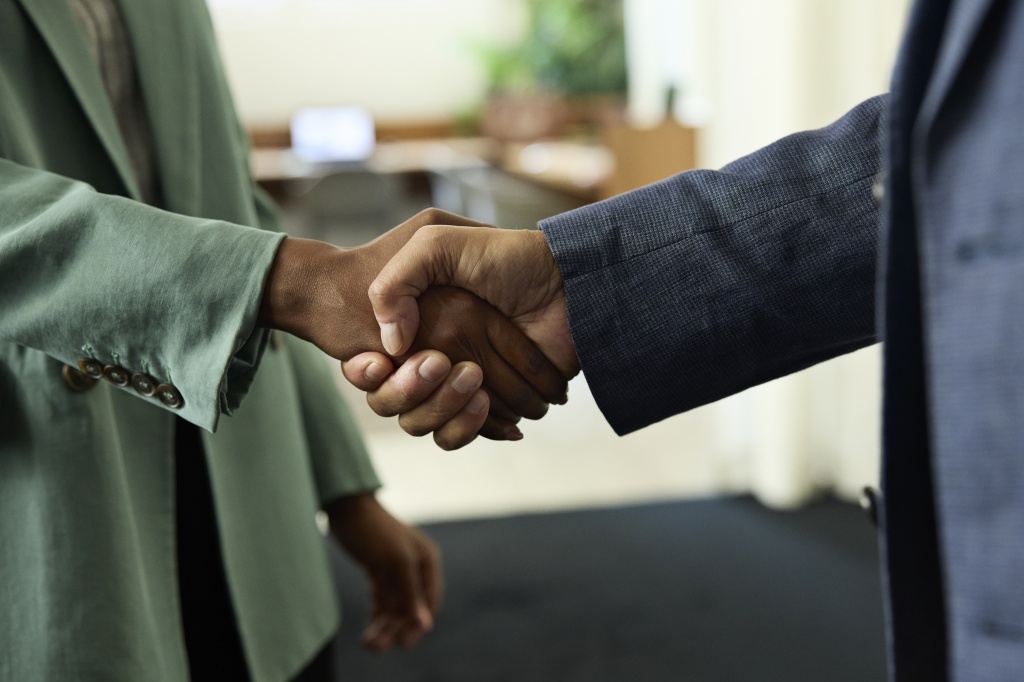 people shaking hands