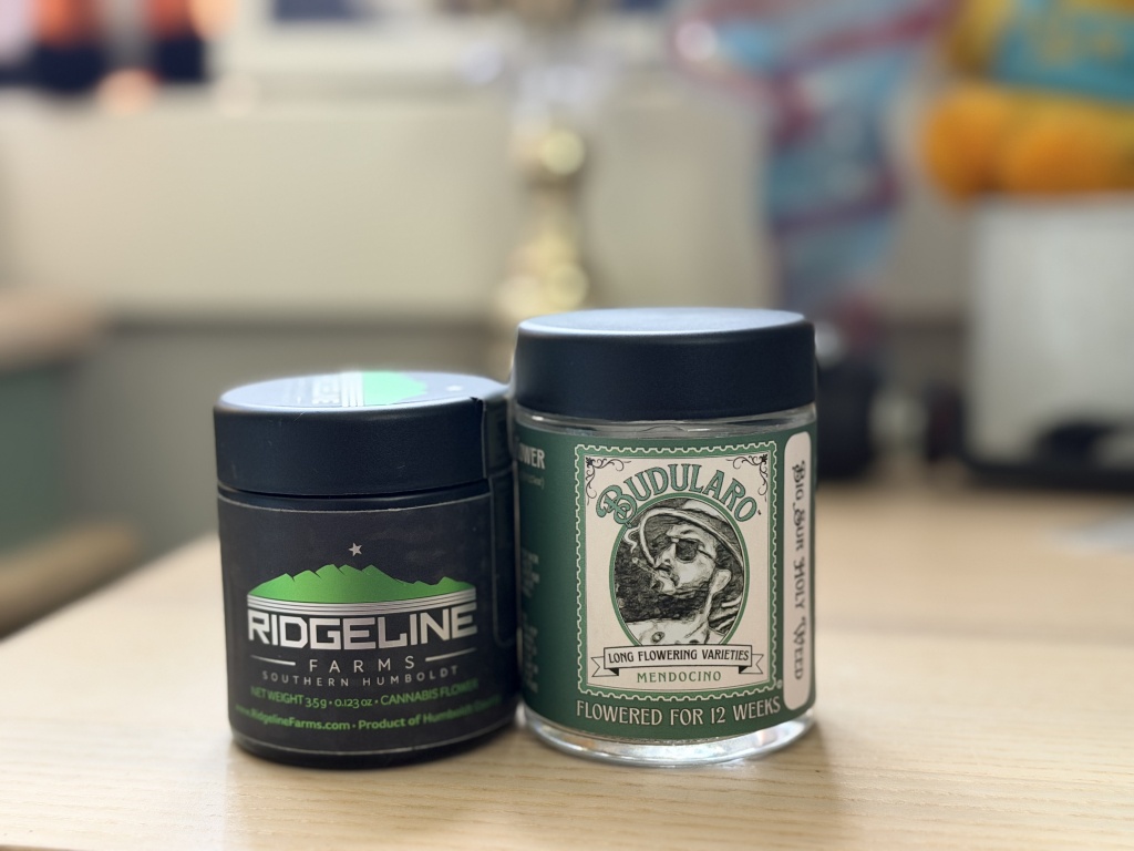 two jars of cannabis flower